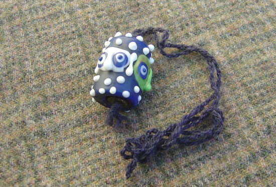 Maskenperle mit 3 Gesichtern, Kroatien/Prozor, 3.-2.Jh.v.Chr.
